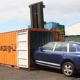 Loading car into container for export Loading car into container for export