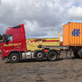 Loading 20ft comtainer onto trailer Loading 20ft comtainer onto trailer